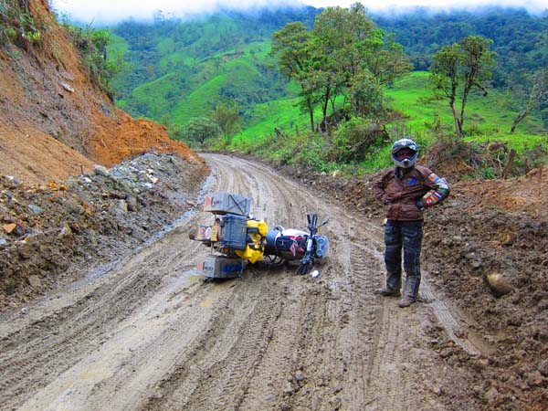 Photo by Angela Perry of herself. Down but not out on my first attempt at serious mud, between Zumba and Vilcabamba, Ecuador on my tour of the Americas, F650GS.