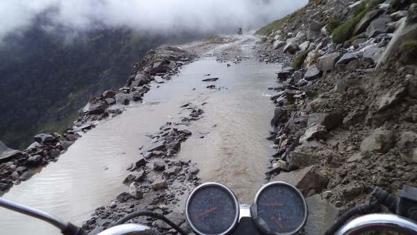 photo by Gregor Zajac, Poland; Crossing Rothang Pass; India tour, Royal Enfield 350ccm.