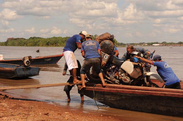 Photo by: Werner Steffens and Claudia Sabel, of Werner Steffens, Germany; Loading the bikes on a boat at the boardercrossing from Bolivia to Brazil, on our RTW trip, R100GS.