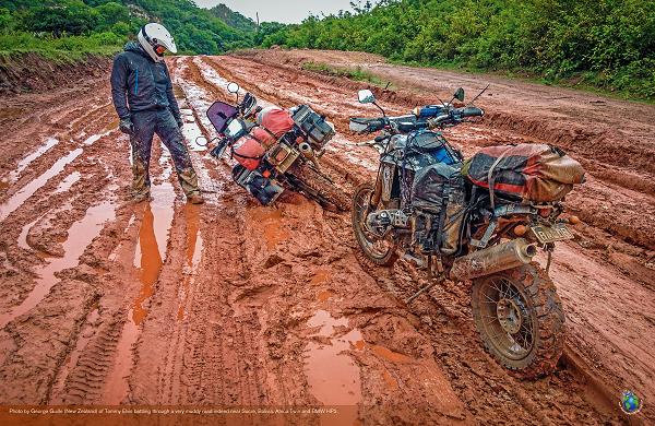 Photo by George Guille (New Zealand) of Tommy Elvis battling through a very muddy road near Sucre, Bolivia.