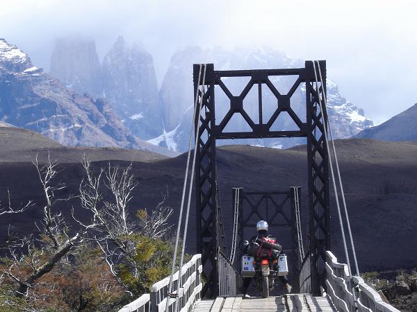 January: by Michel de Schoutheete, Belgium; of Gerald Regnier, Belgium; on South America trip. Crossing a bridge in Park National Torres del Paine, Chile, Honda Transalp.