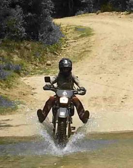 Riding through water, Samaipata Motoclub Bolivia.