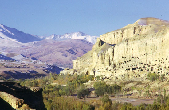 Cliff monk dwellings and mountains