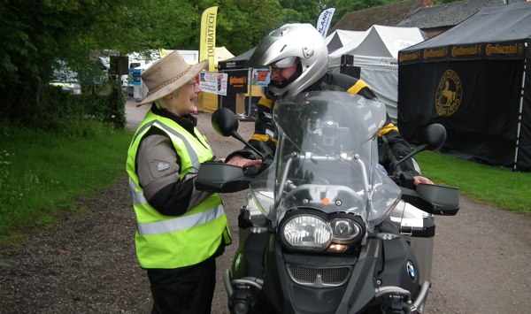 Dee Masters greets a traveller at HUBB UK 2013.