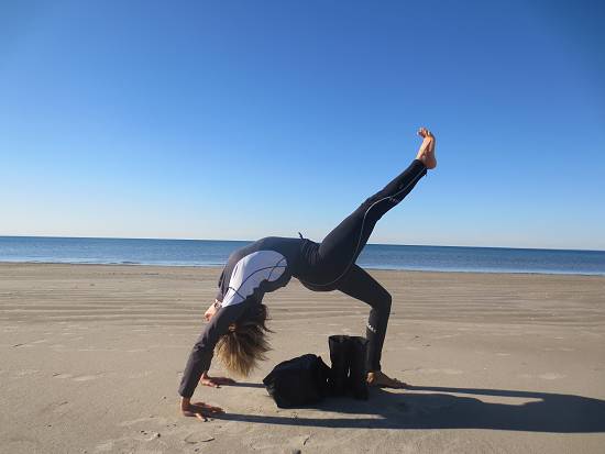 Diana Londono holding yoga pose.