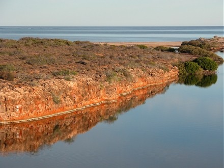 Yardie Creek rust coloured in the early morning
