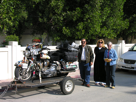 Monther and Lisa readying the trailer to cross the Bahrain causeway