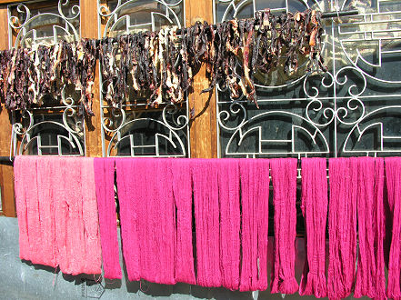 Meat and cotton thread drying in the sun