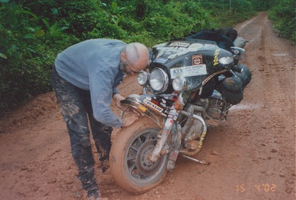 Mud packed up under the guard stopping the wheel from turning