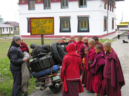 Novice monks admiring the motorcycle at Phodong