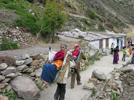Wealthy Indians being carried to pilgrimage sites
