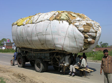 Overloaded tractor trailers slow traffic