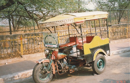 Old Harley converted to a 3 wheeler people mover with diesel motor