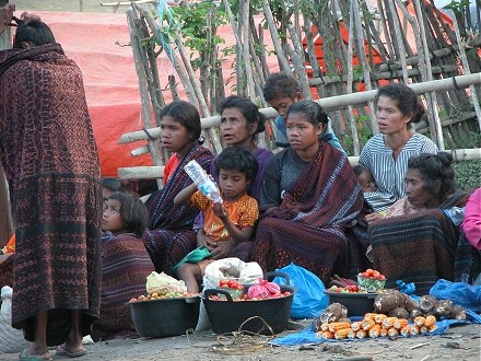 Women waiting to sell produce at the Moni markets on Flores