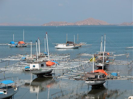 Outrigger boats in Labuanbajo used for fishing with lights at night