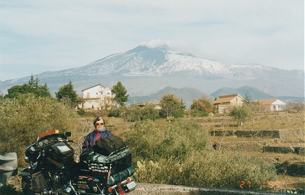 Mt Etna erupting in the background