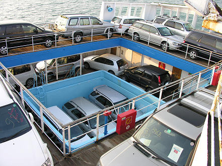 Cars everywhere on the boat to Russia, even three in the swimming pool