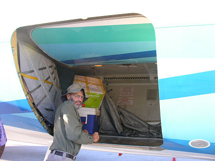 Measuring the cargo door of the Nauru 737 aeroplane