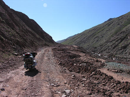 Rough road over landslides to the border