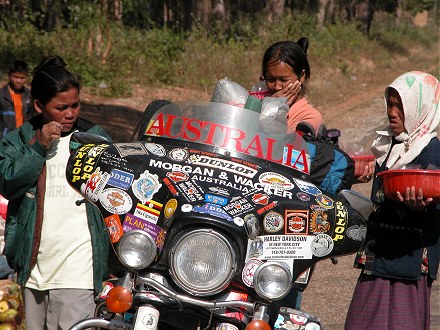 Interested in the motorcycle at a roadside stop