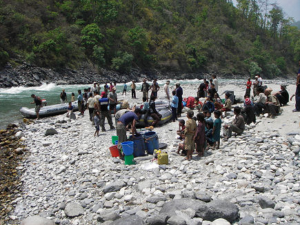 Watched by locals as we ready the rafts