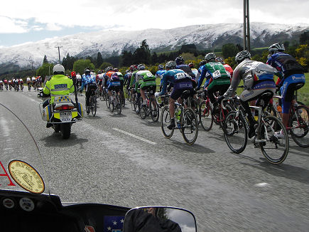 Getting a police escort around the cycle race