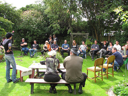 People introducing themselves in the garden.