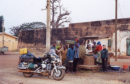 Local women drawing water from the town well