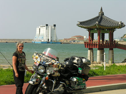 Riding along the waterfront, floating hotel in background