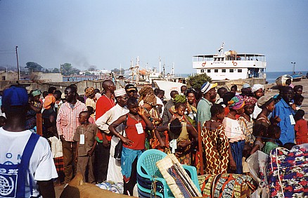 Returning refugees being processed on their arrival