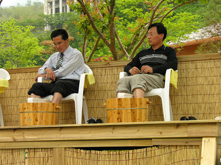 Soaking feet in hot tea at the Ssanggyesa tea festival