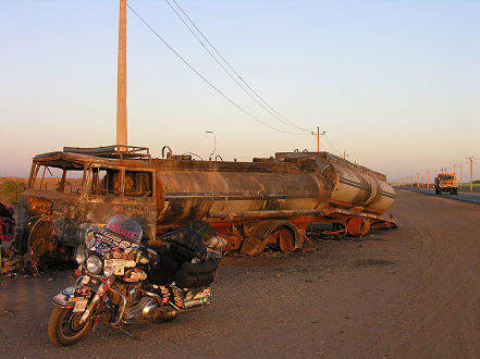 One of many burnt out trucks along the road from Khartoum