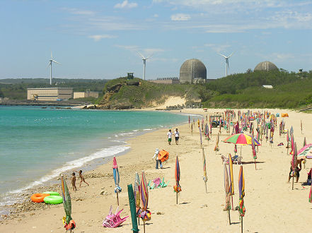 National park beach overlooked by nuclear power station