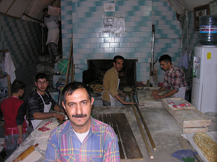 Baking bread in a traditional bakery in Mardin