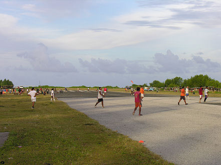 Playing football on the runway in the evenings