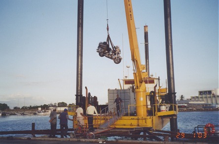 Loading the motorcycle onto an oil rig tender for the trip to Trinidad and Tobago