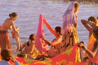 Women washing in the river.