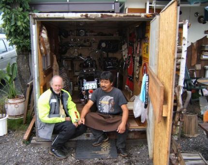 Andy Goldfine and my fellow Indian Motocycle aficionado are pictured above sitting at the entrance of the “museum” the owner had made out of a shipping container for his $32,000.00 1948 Indian Chief.