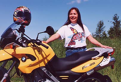 A pretty new motorcycle being taken home by a pretty Alaska Native.