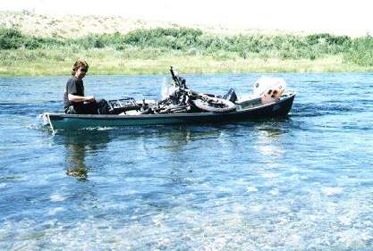 Greg and his bike in canoe