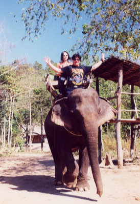 Not all the adventure in Thailand is atop motorcycles on empty, perfect roads. Here I am sharing an elephant ride with Japanese motorcyclist and journalist Akiko Kishimoto.