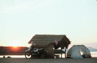 Bike in front of our palapa, El Requeson beach, Baja California.