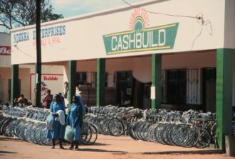 Nuns in front of the bicycle shop, Kasungu, Malawi.