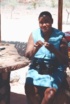 The Artist Known as Queen Elizabeth, carving makalani nuts, Namibia