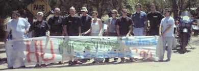 The lineup, with banner, Argentina 2004 HU Meeting.
