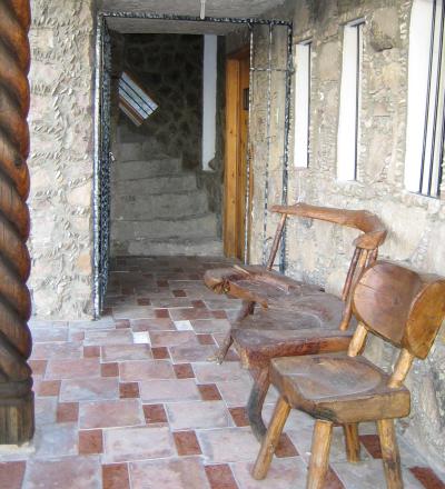 Porch of one of the multitude of designs used for the cabins.