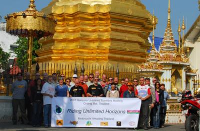 Attendees in front of a Thai Chedi.