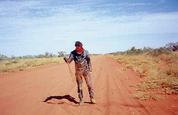 Connor Carson contemplating the quality of sand in Australia's outback.