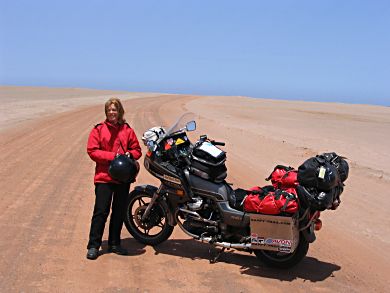 Donna-Rae wondered what riding in the desert was like. After we did some sand and dust in Peru she was ready for smooth pavement again. Piloting the over weight Honda is deep sand was like trying to stay on top of a greased hog, (pig, but that could be a Harley).