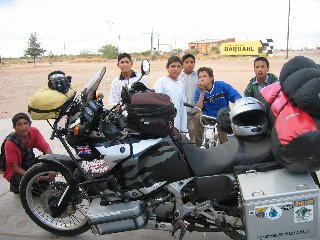 Kids on motorcycles.